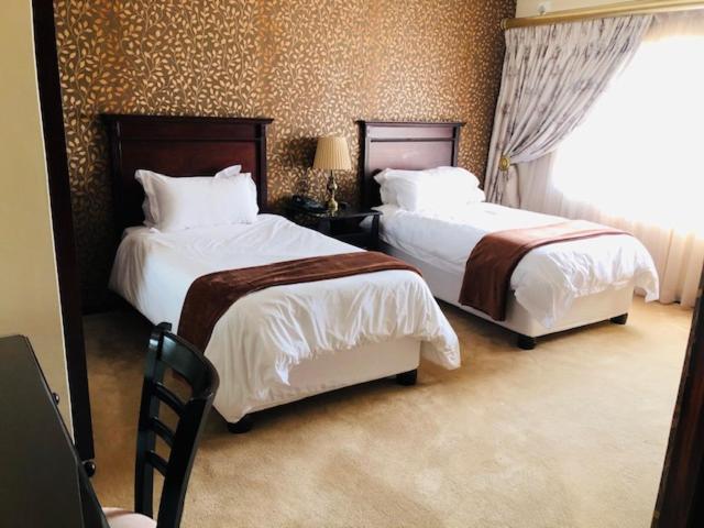 منزيني Ekupholeni Garden Villas المظهر الخارجي الصورة